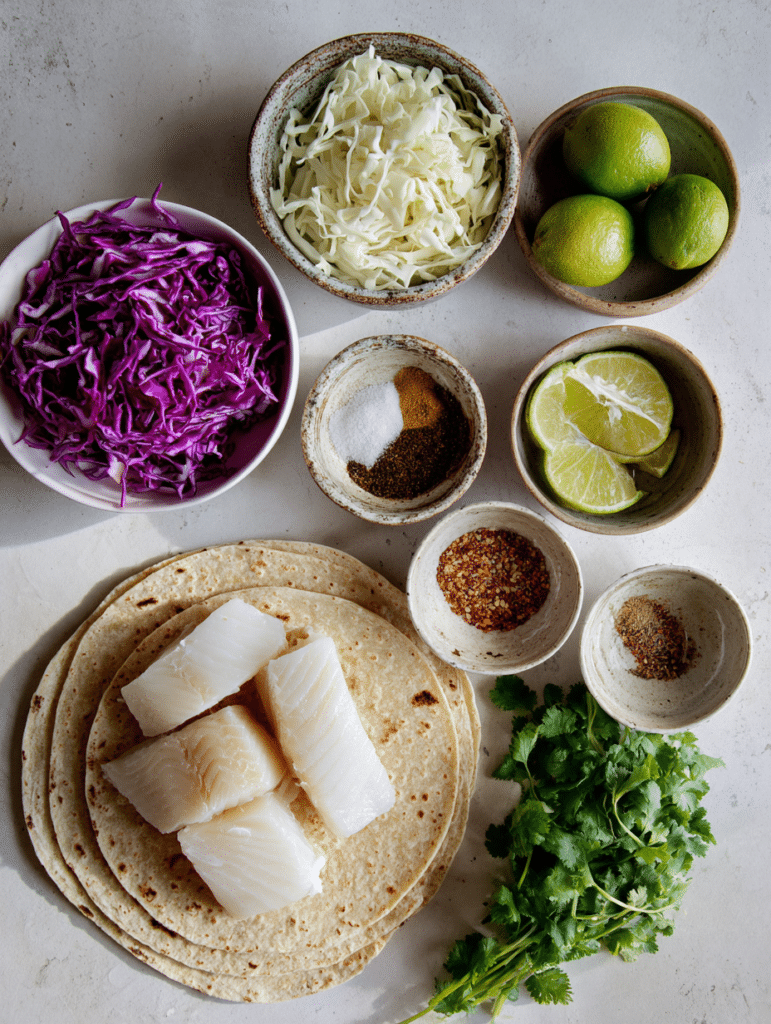 ingredients for air fryer fish taco recipe with fresh fish and slaw