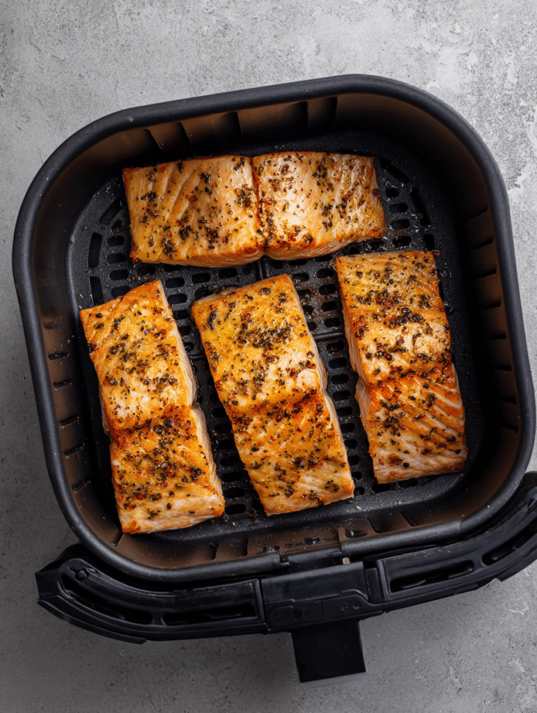 salmon in air fryer basket before cooking